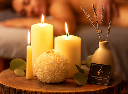 Relaxing spa scene with candles and soap