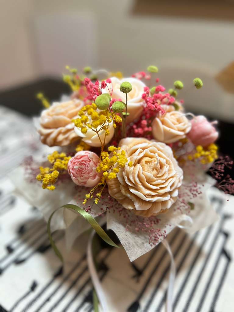 Cream roses bouquet with pink and yellow accents